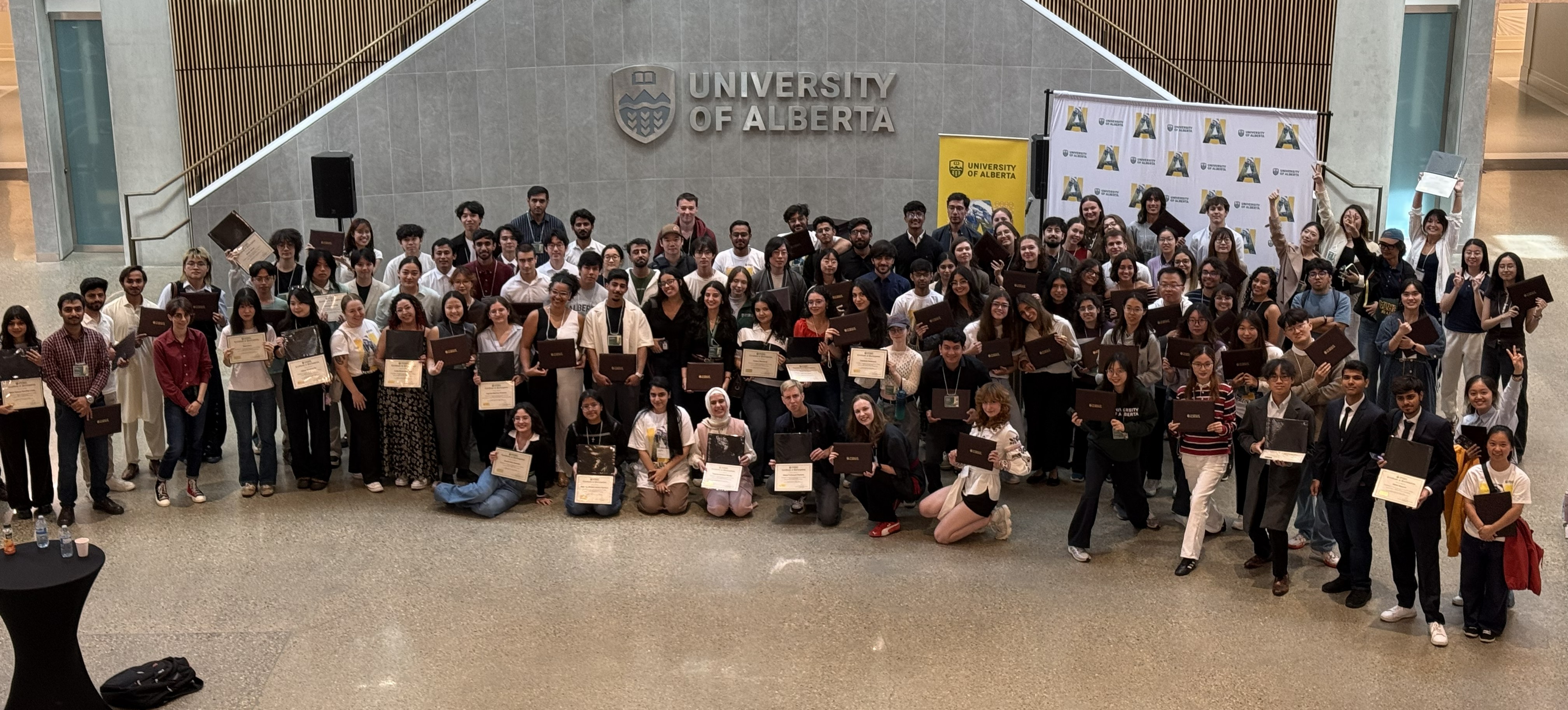 Student Research Internship participants pictured holding their certificates on August 21, 2026