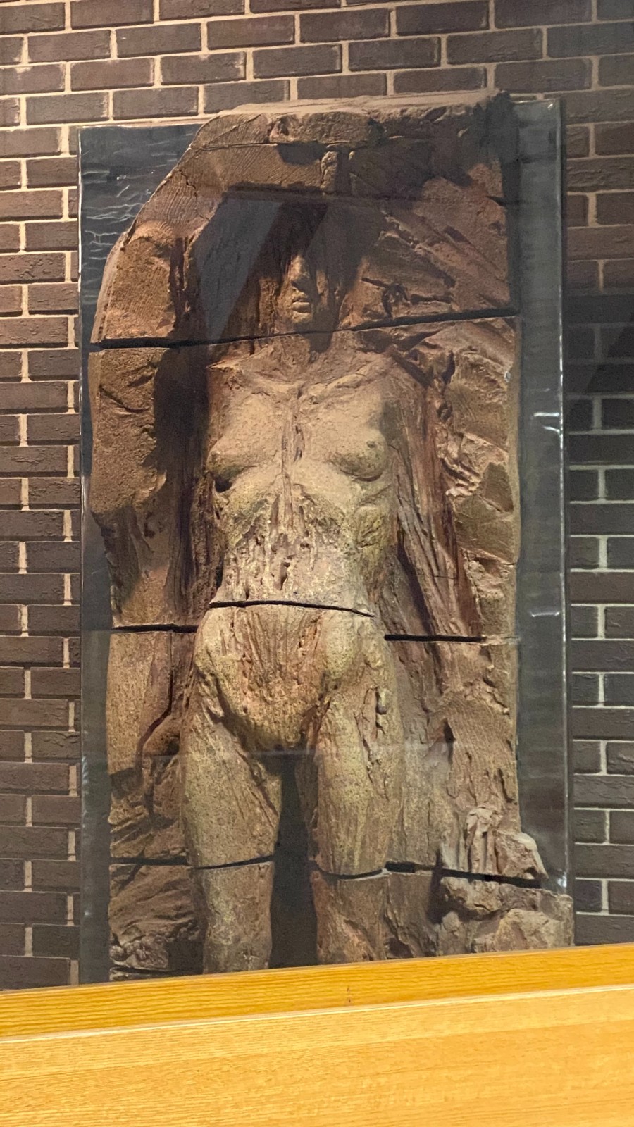 Metal sculpture of human figure