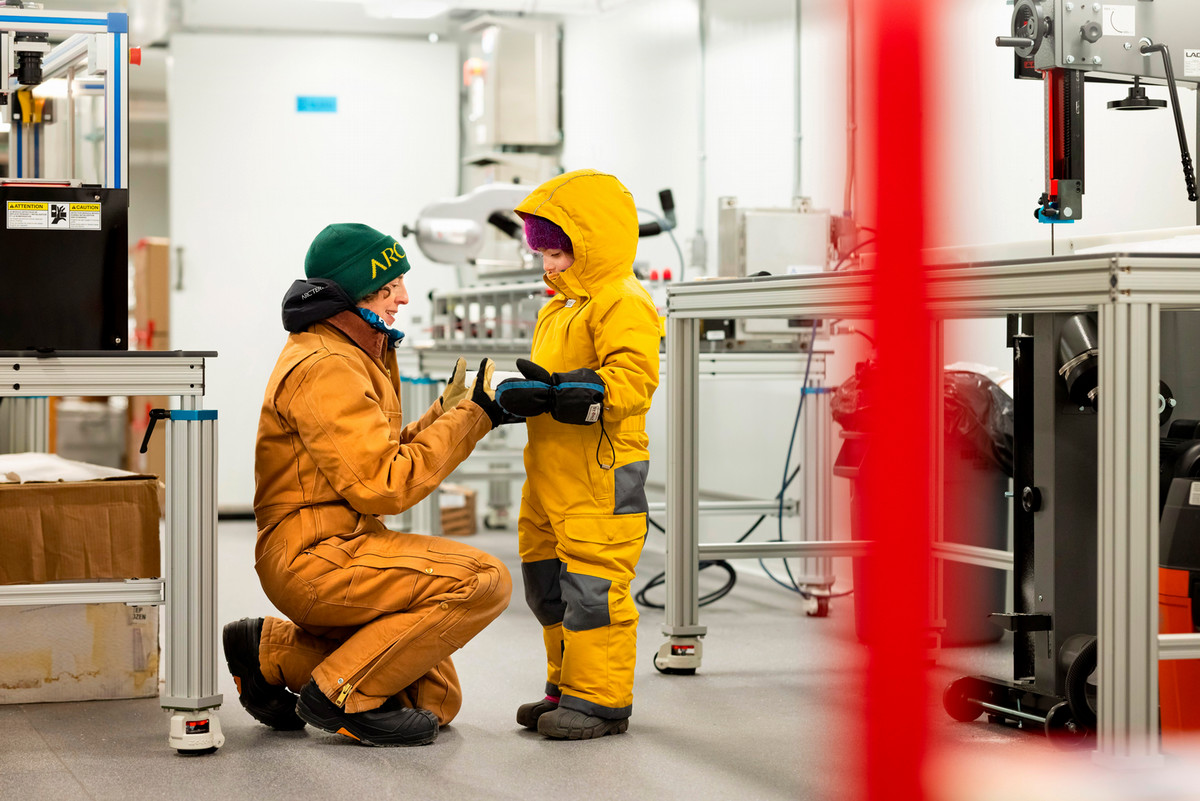 Alison Criscitiello and her daughter Winter bundle up for the freezing temperatures of the Canadian Ice Core Lab.