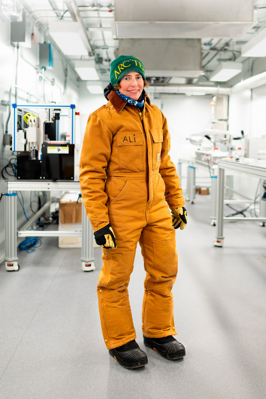 Alison Criscitiello, pictured here in a heavily-lined suit designed for work in the freezing temperatures of the Canadian Ice Core Lab.