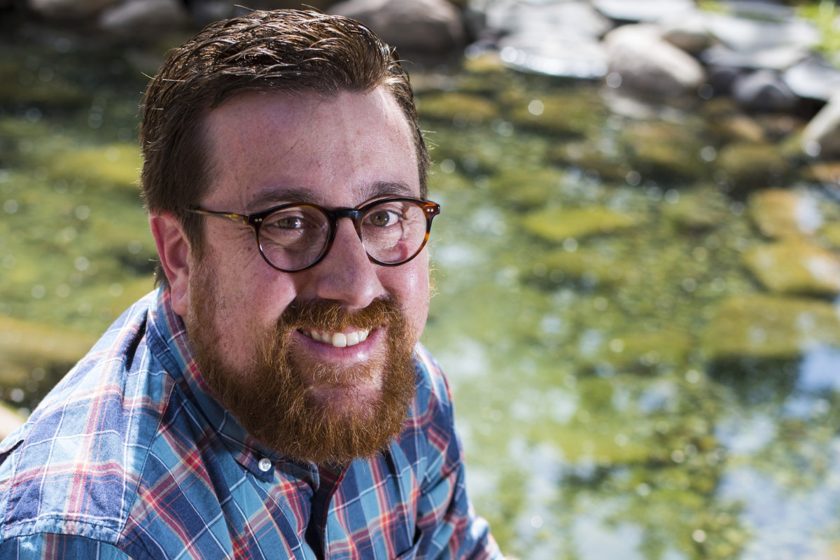 Michael Serpe, professor in the Department of Chemistry, takes on the new role of associate dean (International Relations). Here, Michael is depicted collecting water samples for analysis from a creek.