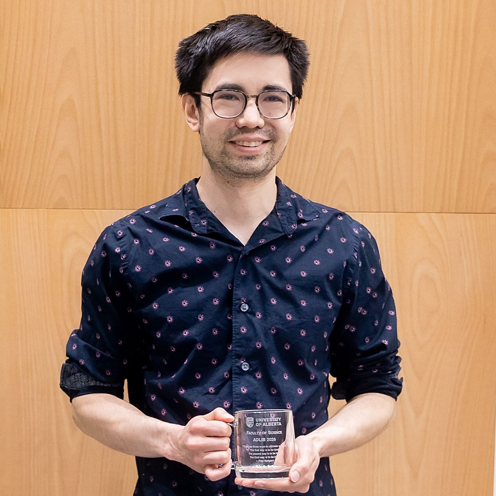 Photo of Ryan Morrill receiving an award at the 2026 Celebration of Excellence.