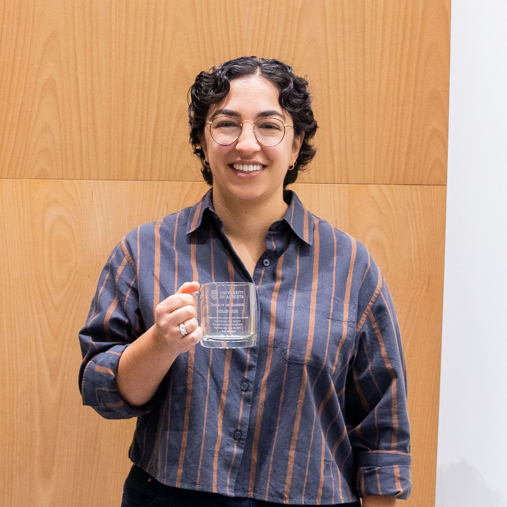 Photo of Shira Joudan receiving an award at the 2026 Celebration of Excellence.