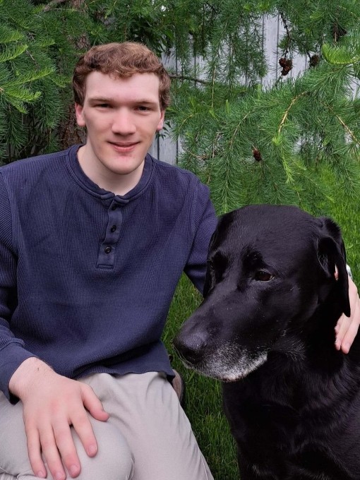 A photo of Christopher Moore and his dog